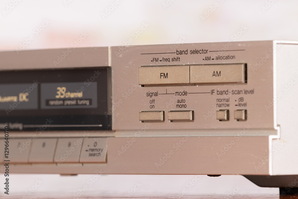 Fototapeta premium Close-Up View of a Vintage Radio Preset Station Panel