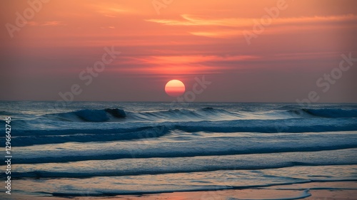 A sun rising over a horizon.