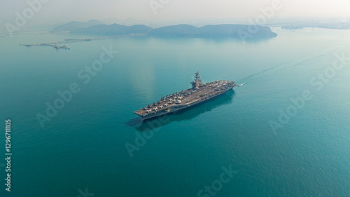 Aerial view navy aircraft carrier at sea.
