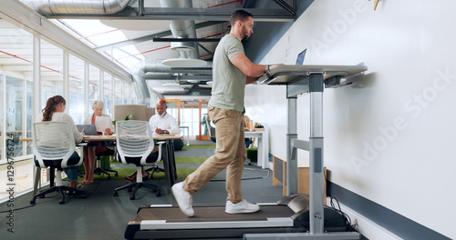 Man, walking and treadmill with a businessman in the breakroom of his office for exercise or mobility. Fitness, health or corporate with a male employee in staying active in the workplace