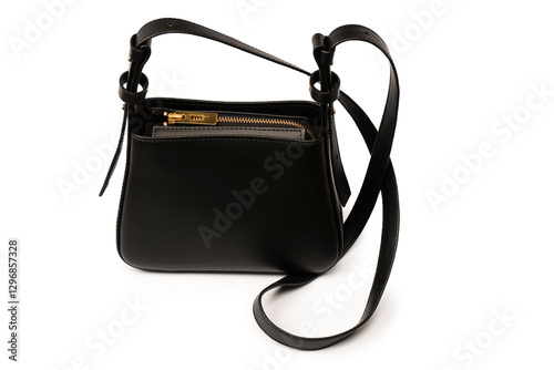 Black small leather cross body bag isolated on a white background.