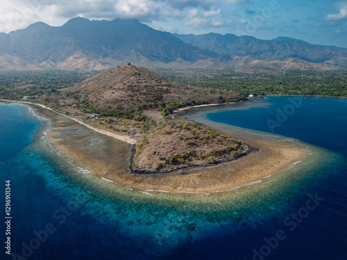 Landscape with blue ocean and mountains in Pemuteran, Bali. Aerial shot photo