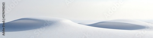 A serene, snow-covered field with a clear sky 