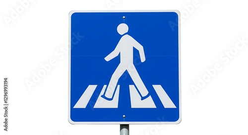 A pedestrian crossing sign featuring a human figure on a blue background, placed on a white backdrop