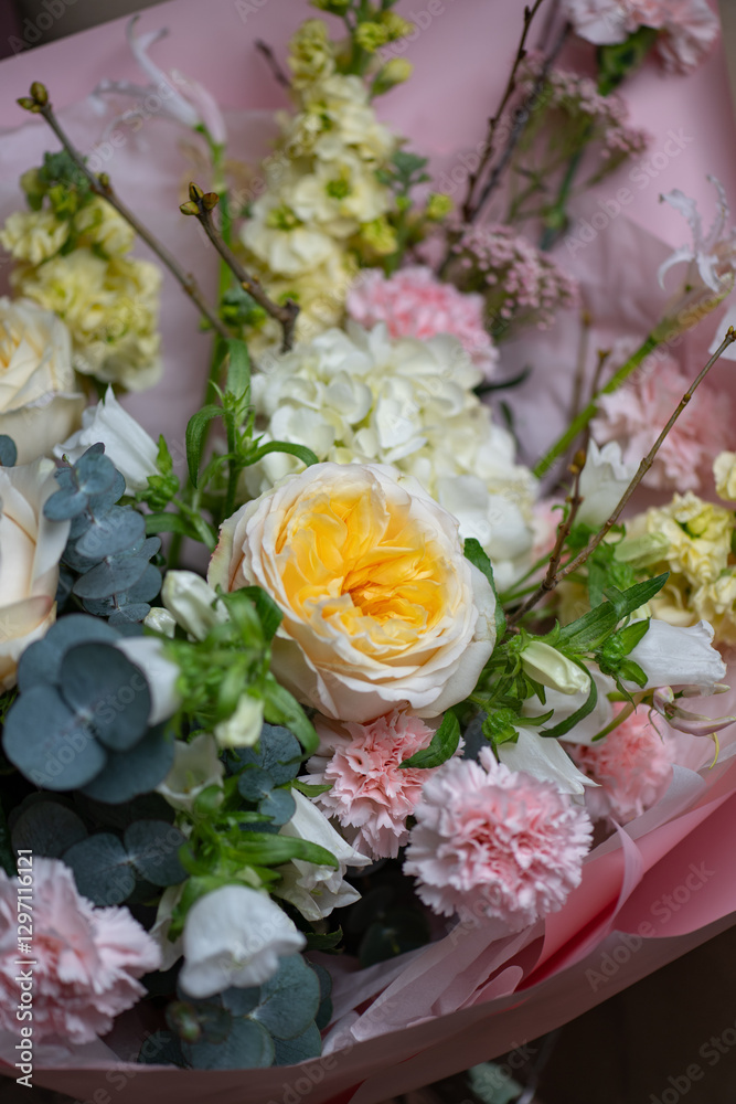 A Stunning Arrangement Featuring a Beautiful Bouquet of Pink and White Roses Alongside Lilies A Stunning Arrangement Featuring a Beautiful Bouquet of Pink and White Roses Alongside Lilies