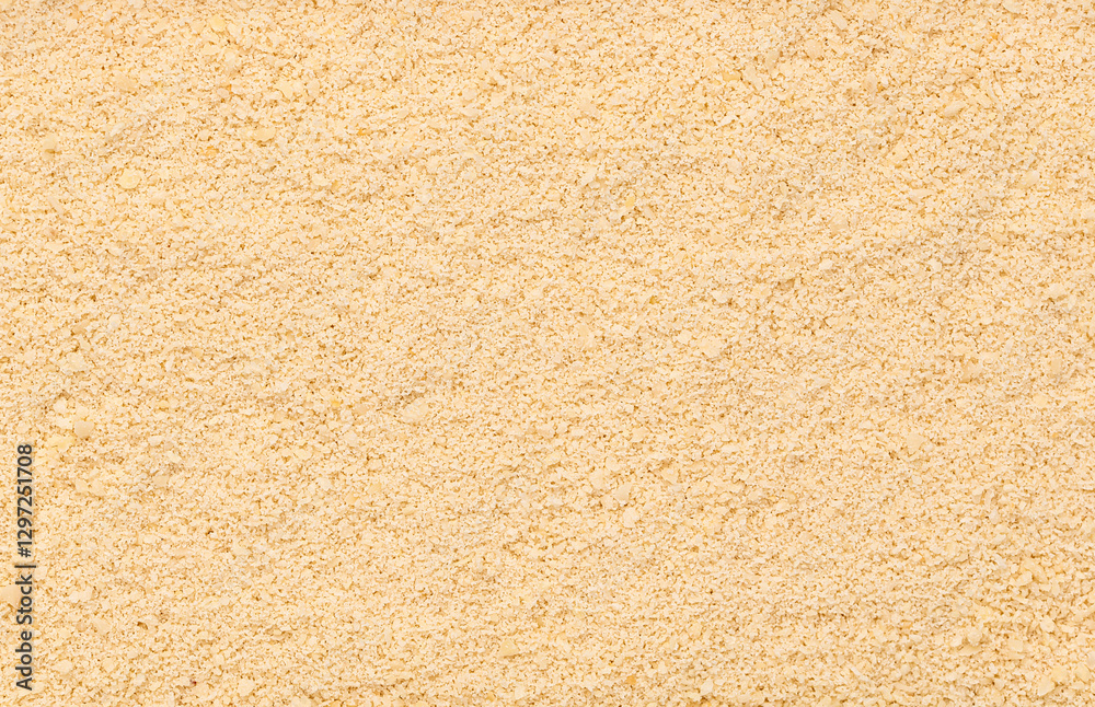 Macro photography of ground almonds, alternative keto flour, chopped raw nuts, ketogenic diet, healthy vegan food