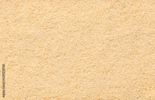 Macro photography of ground almonds, alternative keto flour, chopped raw nuts, ketogenic diet, healthy vegan food