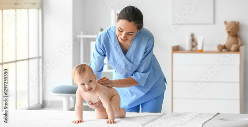 Massage therapist working w...