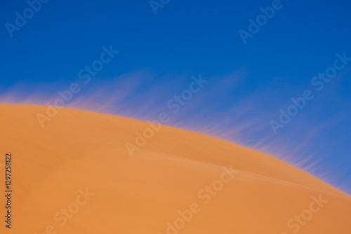 Fototapeta Naklejka Na Ścianę i Meble -  Wind blowing sand dunes in Utah.