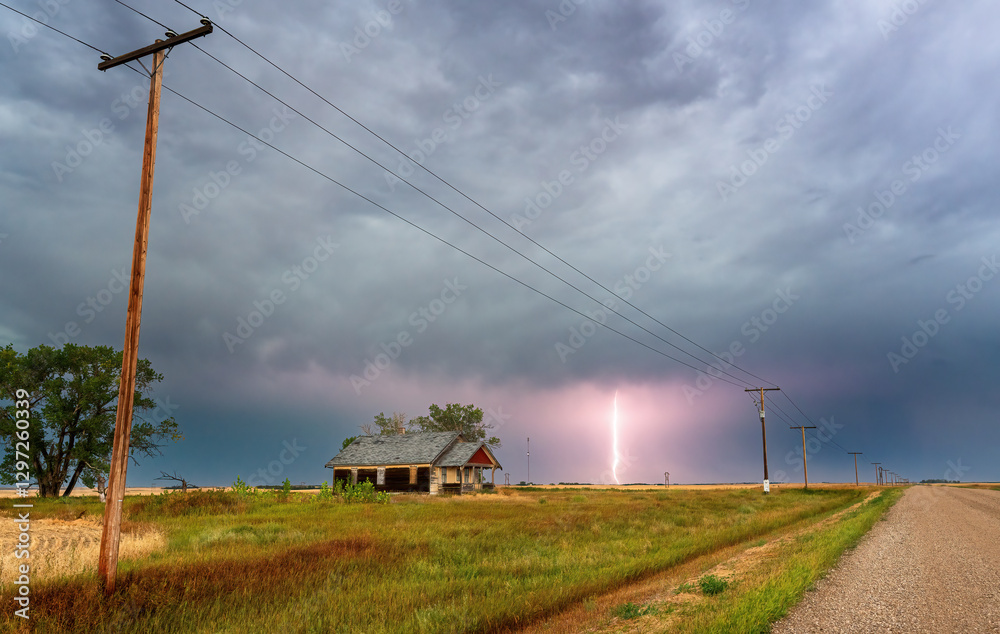 Lightning strikes near abandoned farmhouse in saskatchewan, canada