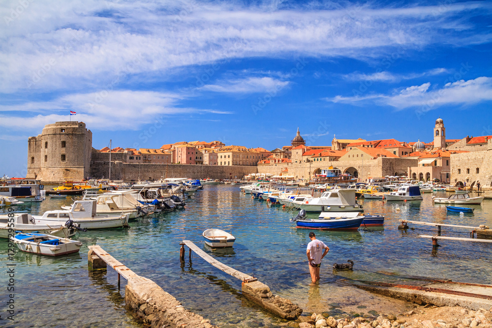 Coastal summer landscape - view of the City Harbour and marina of the Old Town of Dubrovnik on the Adriatic coast of Croatia