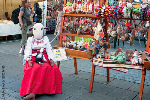 Summer cityscape - view of the folk fair on the Main Market Square in the Old Town of Krakow, Poland