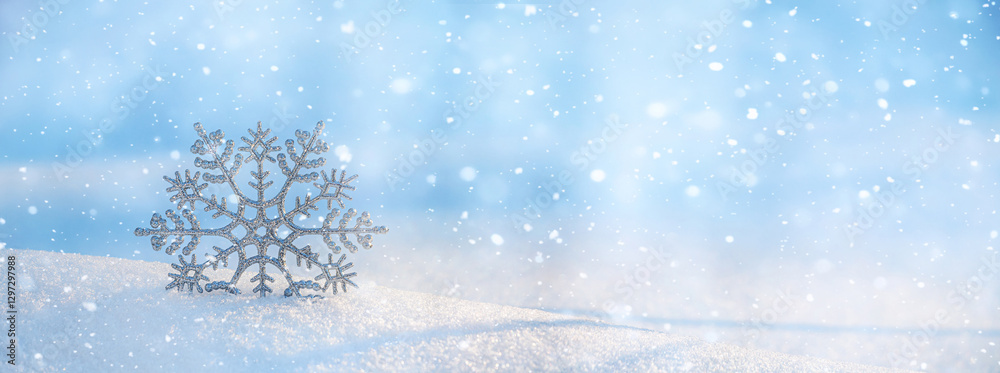 Christmas winter background, banner - view of decorative snowflake in sparkling snow, copy space for text