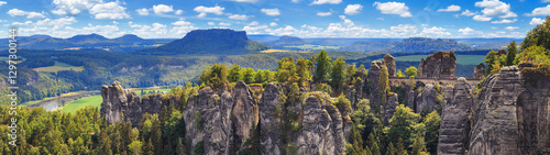 Obraz na płótnie Beautiful landscape, panorama, banner - view of the Bastei rock formations with the Bastei Bridge in the Elbe Sandstone Mountains, Saxony, Germany w salonie