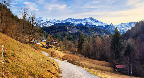 Obraz na płótnie Rural landscape - view of the countryside near in the alpine ski town of Garmisch-Partenkirchen against the background of the Alps, in Upper Bavaria, Germany w salonie