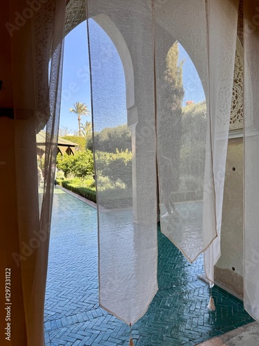 Voil curtains over doorway in  Le Jardin Secret in the old Medina Marrakesh Morocco North Africa