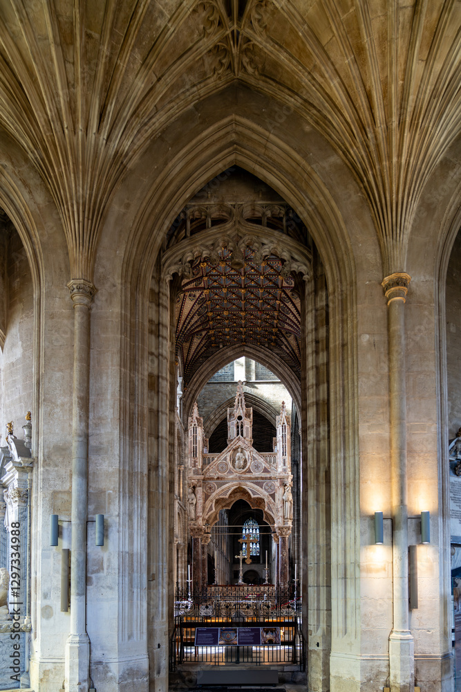 Peterborough Cathedral interior showing arches, columns and ornate ceiling Peterborough Cathedral interior showing arches, columns and ornate ceiling