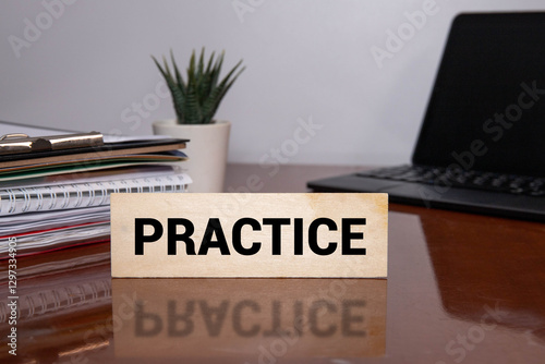 Practice word wooden cubes on pink background