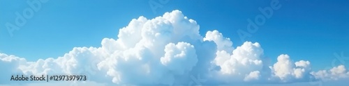 A large white cloud covers the entire blue expanse of the sky with its soft and puffy edges, soft cloud formations, blue sky