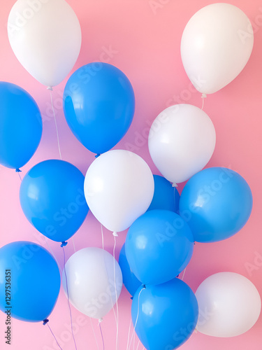 Wallpaper Mural Colorful balloons in blue and white against a soft pink background for festive occasions. Torontodigital.ca