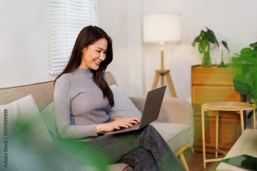 Beautiful freelancer happy asian thai lady working on laptop and planning and online at home
Beautiful freelancer happy asian thai lady working on laptop and planning and online at home