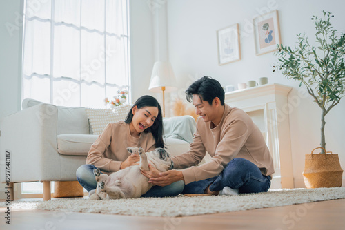Asian family stay at home together with dog on holiday. Love couple lifestyle.