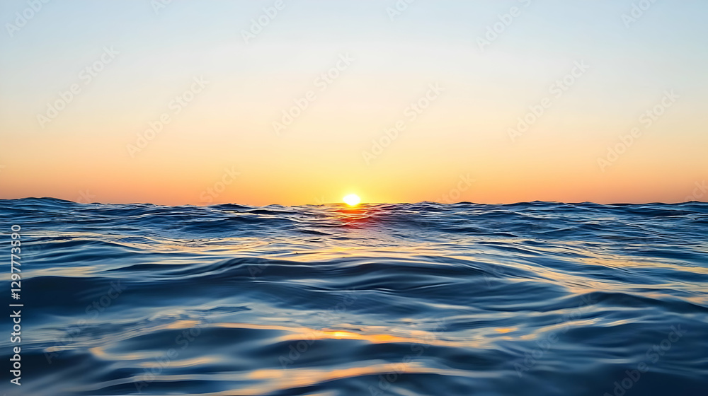 Ocean Sunset Scene with Golden Sunlight Reflecting on Blue Water Surface Ocean Sunset Scene with Golden Sunlight Reflecting on Blue Water Surface