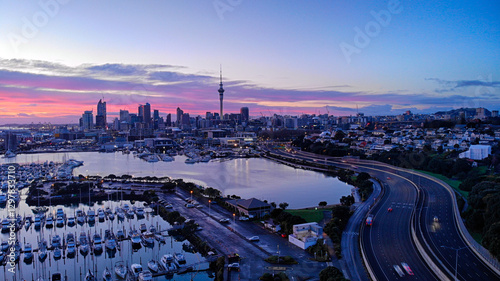 Aerial photo of Auckland Harbour, city and yachts at sunset