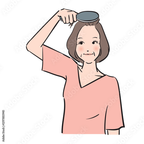 髪のブラッシングを入念にする大人の女性