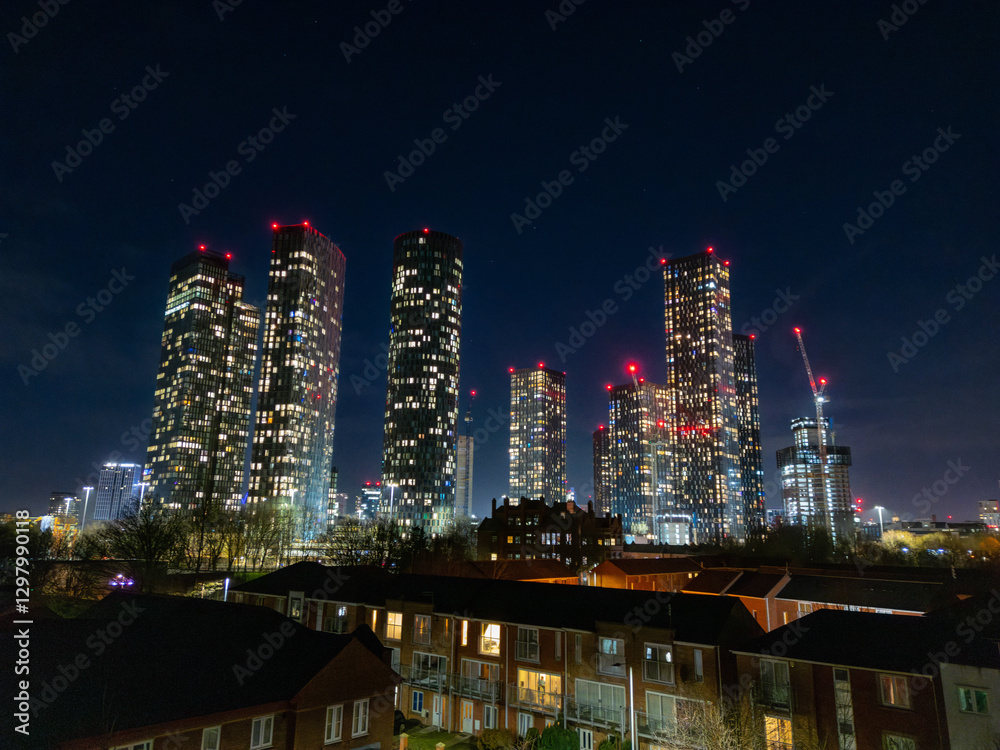Fototapeta premium Sunrise Over Manchester Deansgate Square and Castlefield