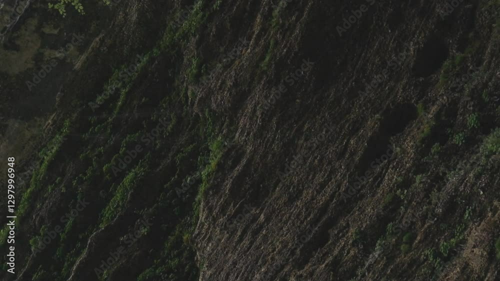 Pericnik waterfall is a beautiful drop from the mountain cliff, in Triglav National Park. Slovenian waterfall. Long for walking and trekking, enter inside the cave to admire it. Powerful and majesty.