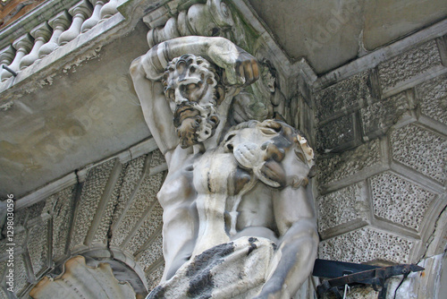 historic building with beautiful statues in need of renovation, saint petersburg, russia