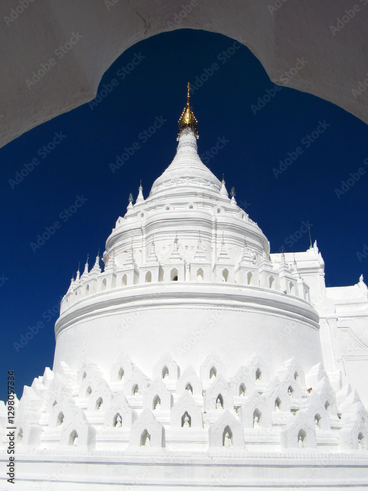 Mandalay, Myanmar - January, 2017 : An interesting white stupa. Editorial Photo. Mandalay, Myanmar - January, 2017 : An interesting white stupa. Editorial Photo.
