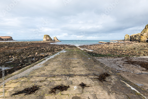 View of the Brough Bay near Brough village, Scotland's most northerly mainland village, Caithness, United Kingdom. Coastal scenery near Brough.