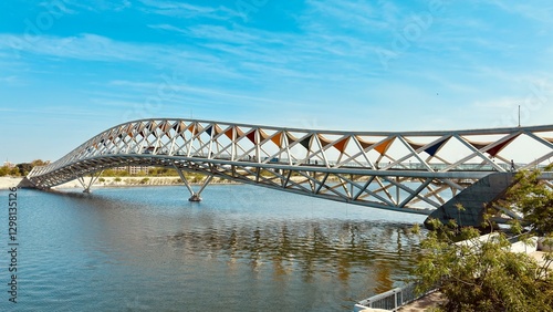 Fotografie Experience the Atal Pedestrian Bridge at Sabarmati Riverfront, Ahmedabad, with this stunning landscape photo