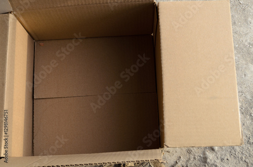 Open empty cardboard box for shipping and packaging