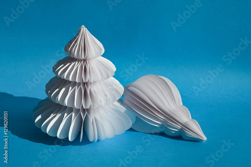 white paper decor for new year and Christmas, decoration. background for the design. the blue color.