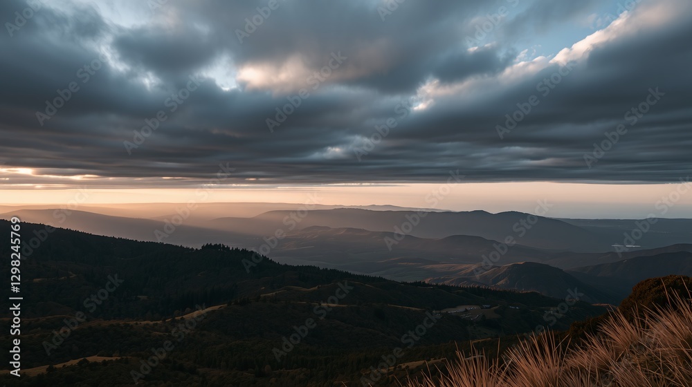 Intensely dramatic landscape filled with rolling hills and dark, brooding skies. Intensely dramatic landscape filled with rolling hills and dark, brooding skies.