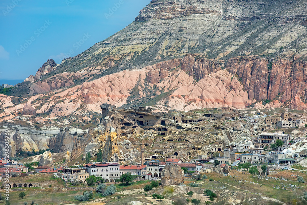 Stunning landscape of Cappadocia showcasing rock formations and unique cave dwellings.