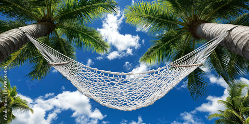 Hammock between palm trees spring break vacation with copy space, blue and green, relaxation and holiday with copy space