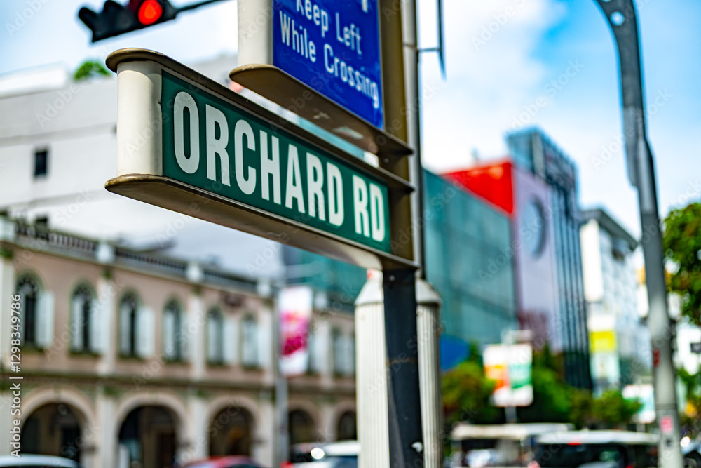 Obraz premium Street name sign of Orchard Road in Central Area of Singapore
