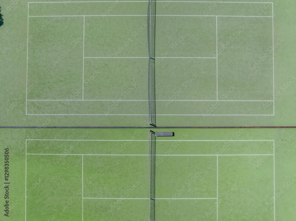 Empty tennis court, overhead view, ready for play. No players, just lines and net. SAINT HELIERS, AUCKLAND, NZ Empty tennis court, overhead view, ready for play. No players, just lines and net. SAINT HELIERS, AUCKLAND, NZ
