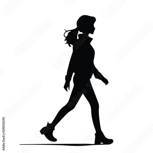 Silhouette of a woman walking stylishly dressed