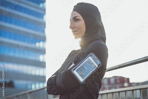 Photography Muslim urban runner training in the city center