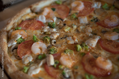 a professional chef assembles and cooks a delicious pizza. photo