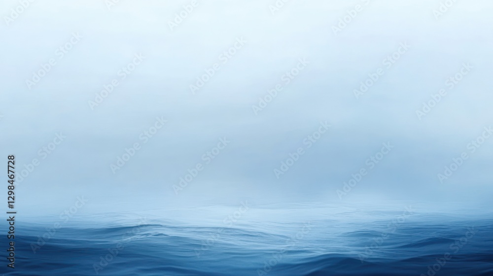 Fototapeta premium Misty Ocean Serenity: A Tranquil Seascape in Blue Hues