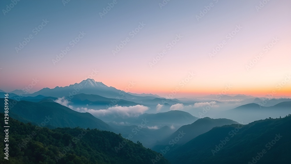 Sunset over misty mountains with a scenic view of the forest, hills, and clouds at dawn Sunset over misty mountains with a scenic view of the forest, hills, and clouds at dawn