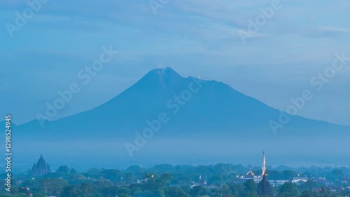 Jogja, Indonesia - February 5, 2025. 4k timelapse, morning atmosphere in Prambanan area with Sojiwan temple in the background, Sojiwan temple and Mount Merapi. photo