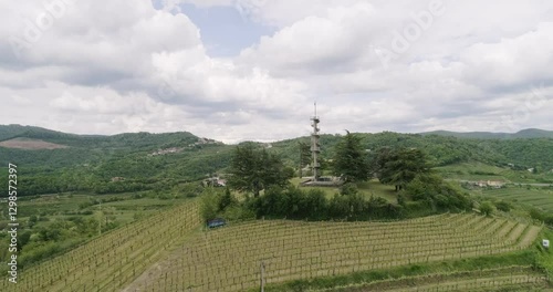 Aerial drone view pan of the Collio hills, Cormons, Nova Gorica near Gorizia. European Capital of Culture 2025. Typical local products vineyards and wines. Gonjače Tower places to visit and tradition.