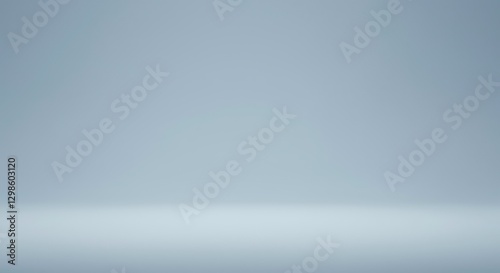 Elegant Blue Backdrop: An empty studio space bathed in soft, gradient blue light, providing a versatile background for product displays or artistic concepts.